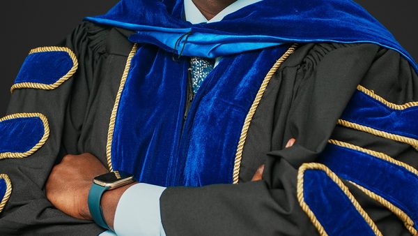 Dr. Sariki Abungwo Awarded Triple Doctorate and Releases Built by Design